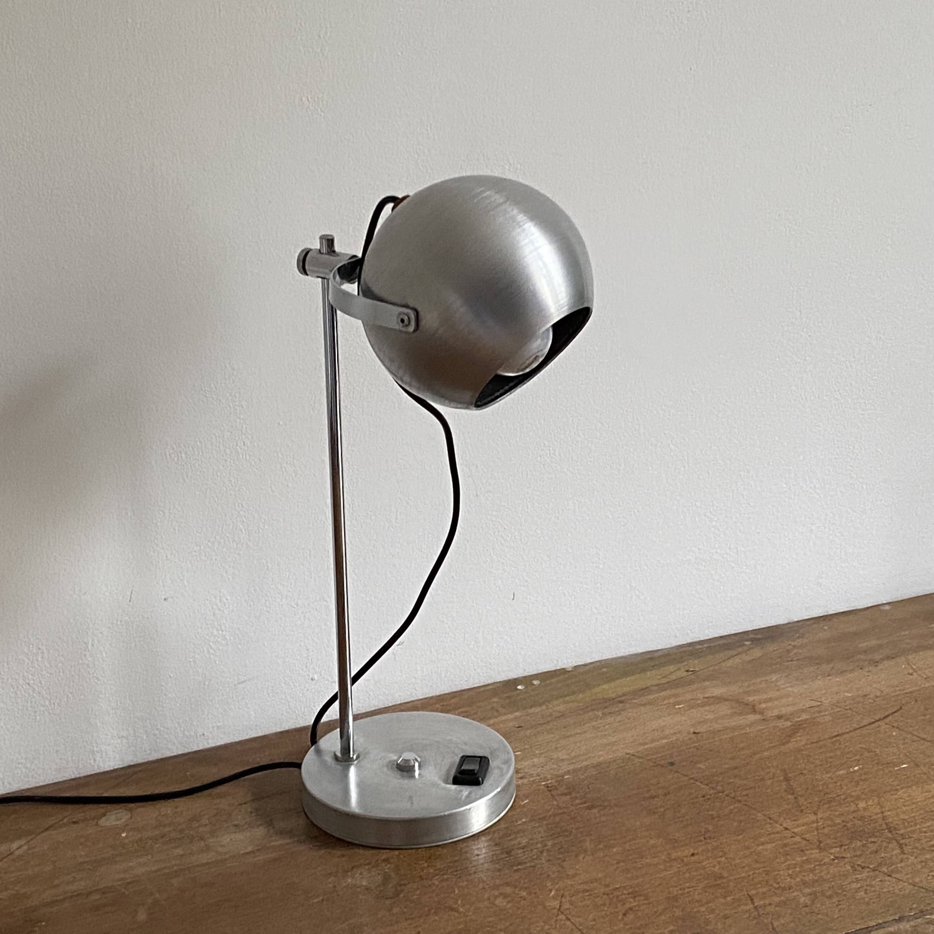 Eye ball lamp. 1970. Brushed stainless steel.
