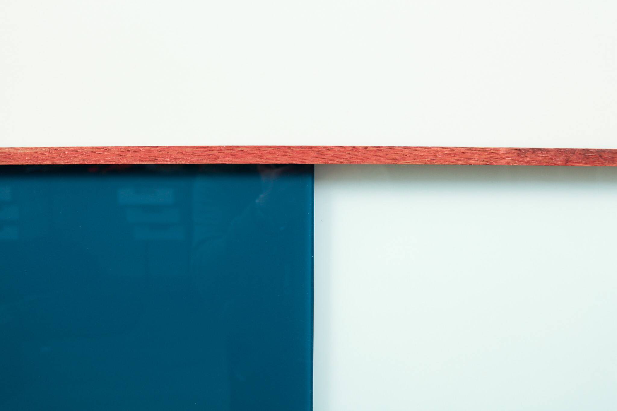 Vintage mid-century wall hung oak cabinets, blue & white sliding glass door