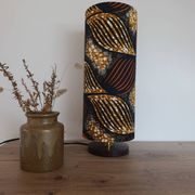 Tube lamp with wooden base and wax boho-ethnic fabric