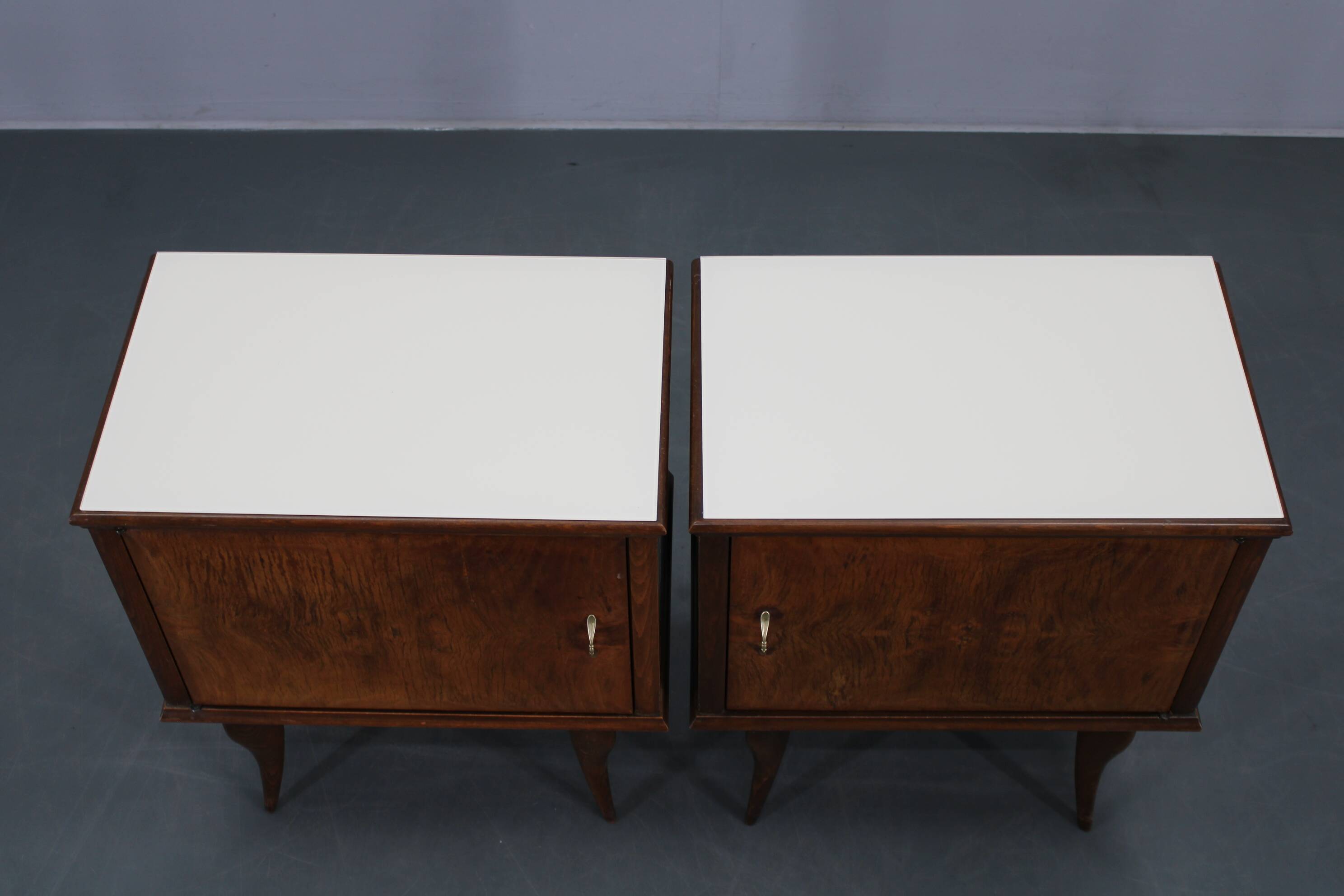 Pair of mid-century Italian walnut nightstands with glass top, 1950s