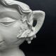 Large white earthenware flowerpot with faun heads circa 1900