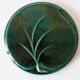 Green ceramic trivet in the shape of a leaf - Vintage 1960