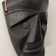 Ethnic ebony wood mask for display or hanging.