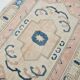 Tapis vintage en laine et coton pêche et bleu