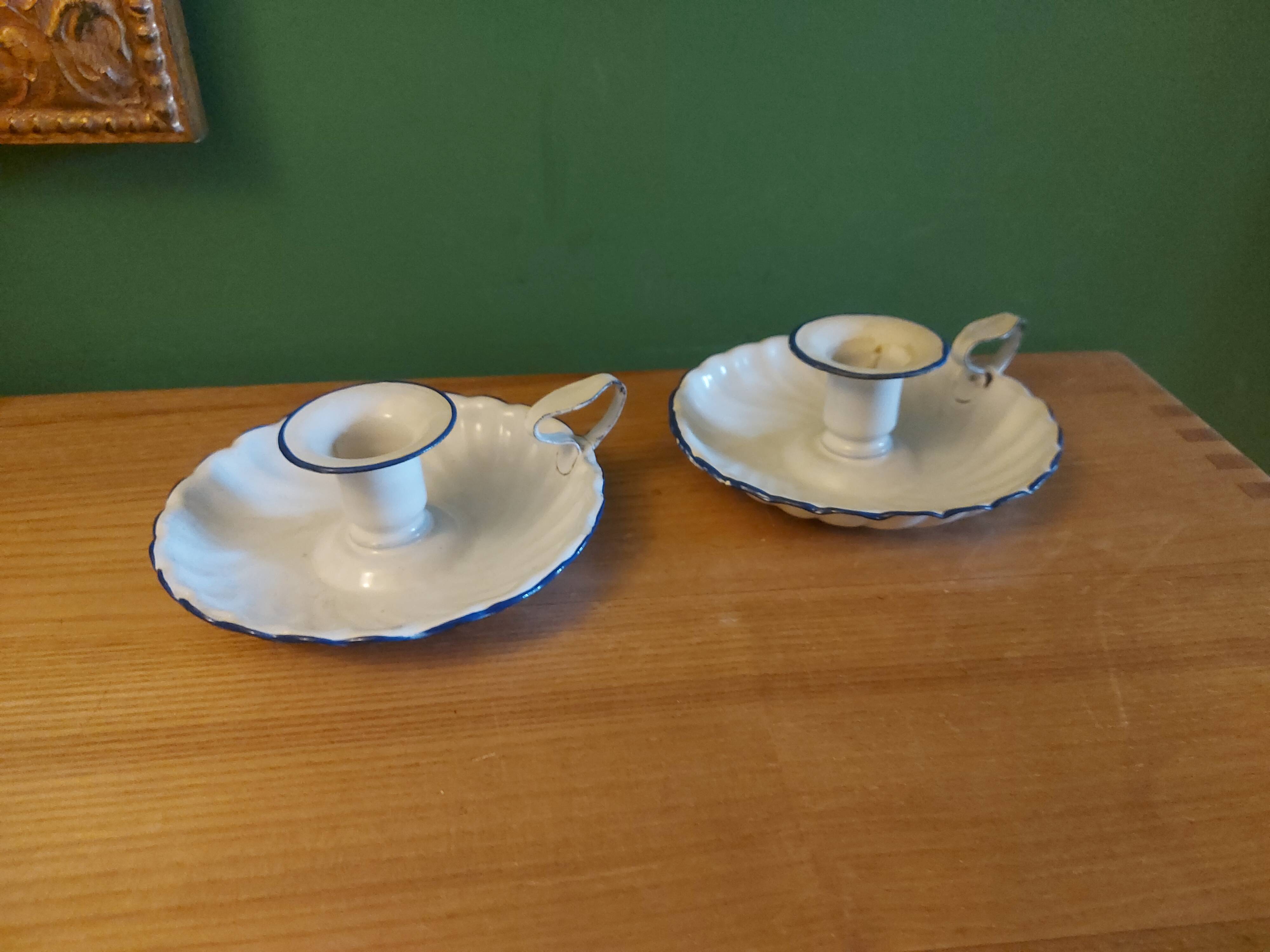 Pair of enamelled candle holders