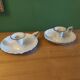 Pair of enamelled candle holders