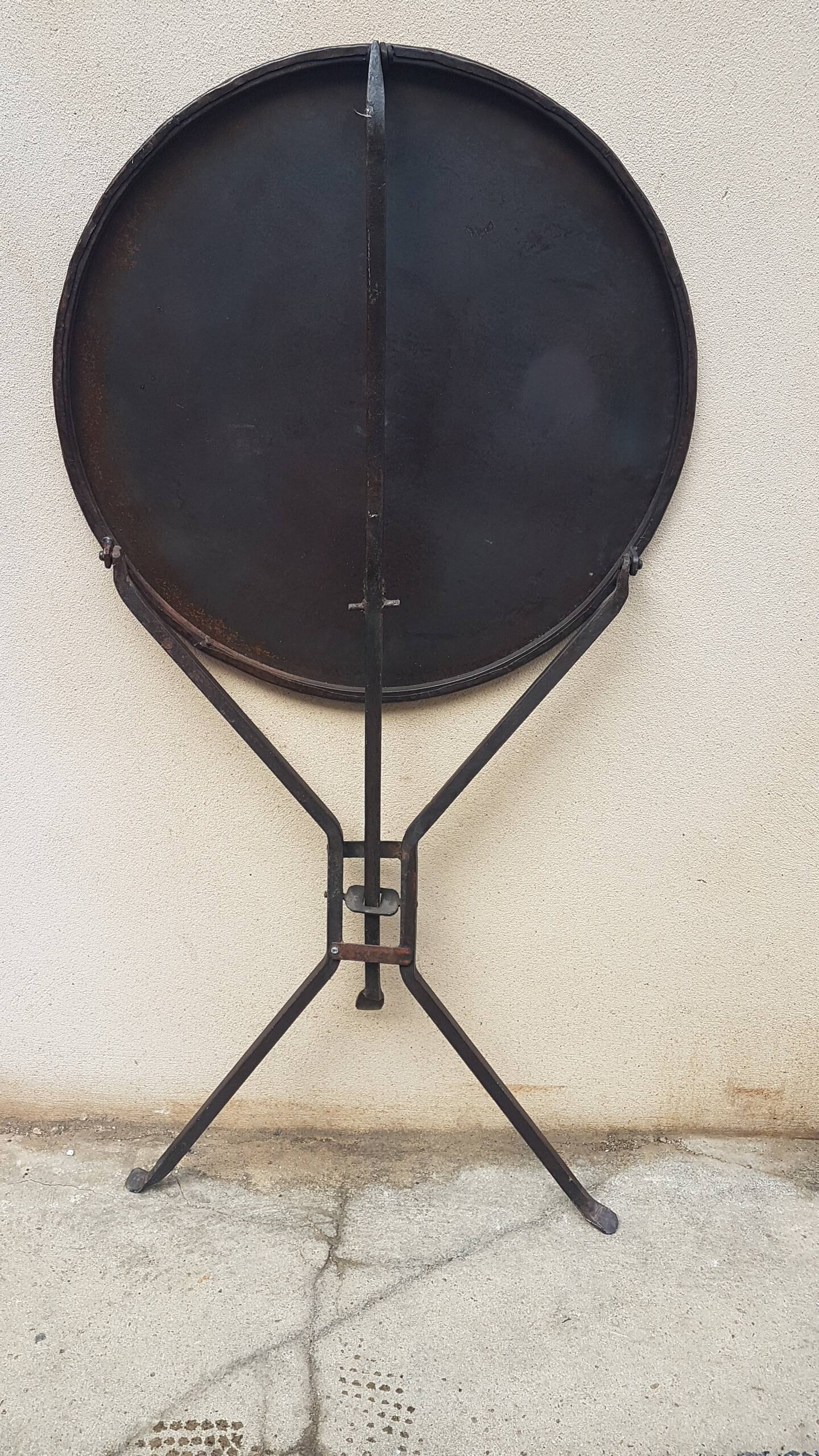 Old foldable tripod pedestal table