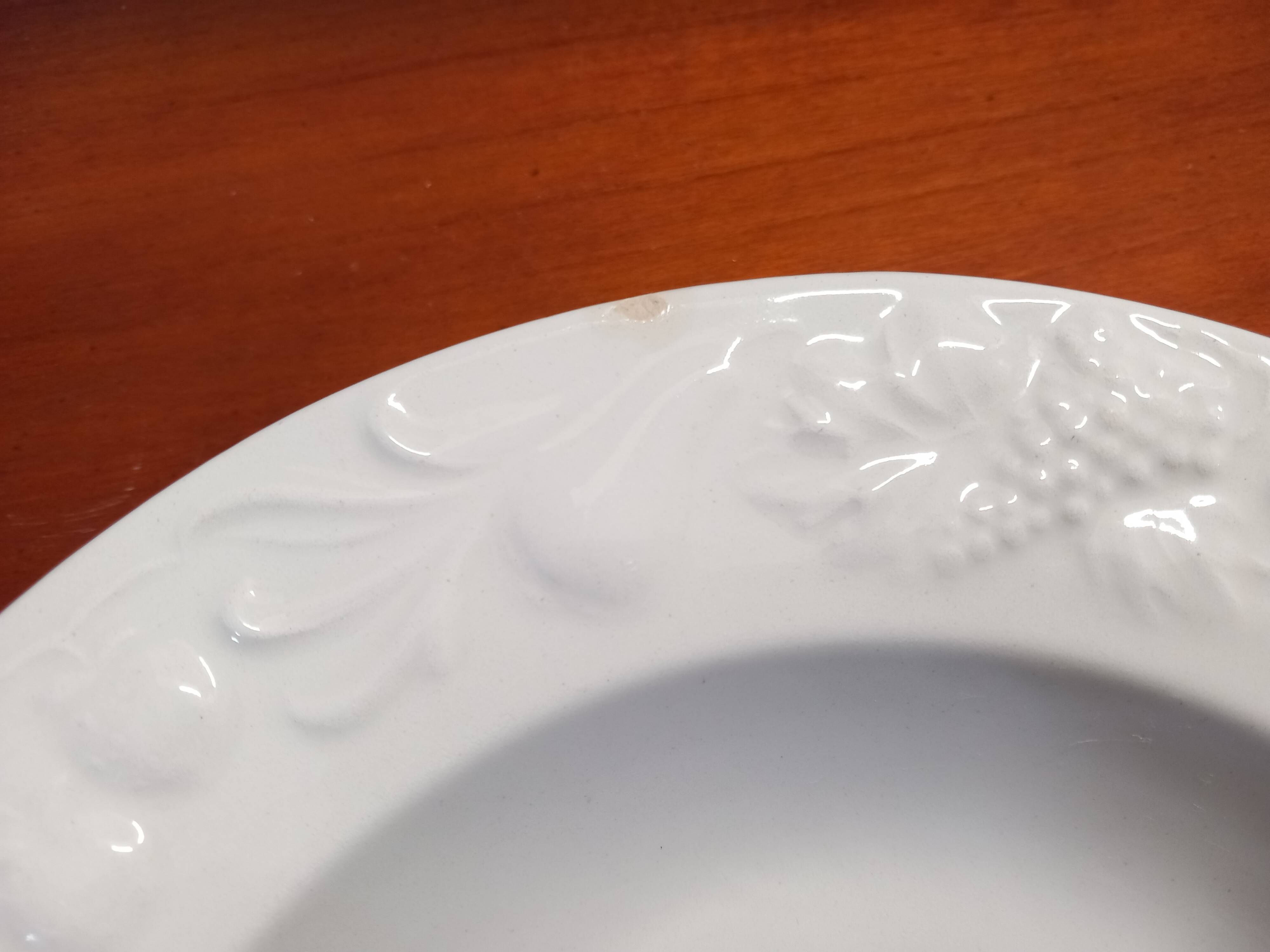 Set of 6 white ceramic deep plates made in Italy.