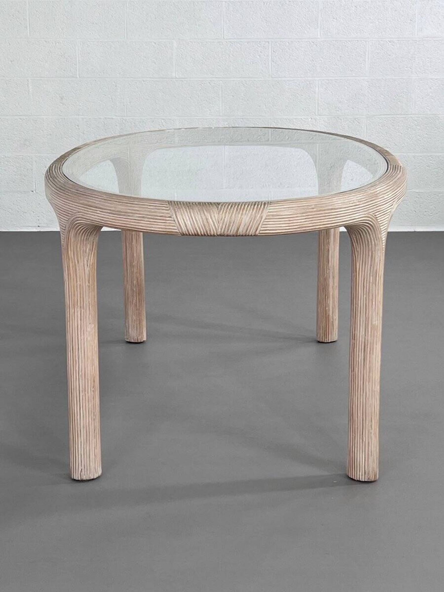 Oval table in marquetry of rattan and glass Vivai del Sud