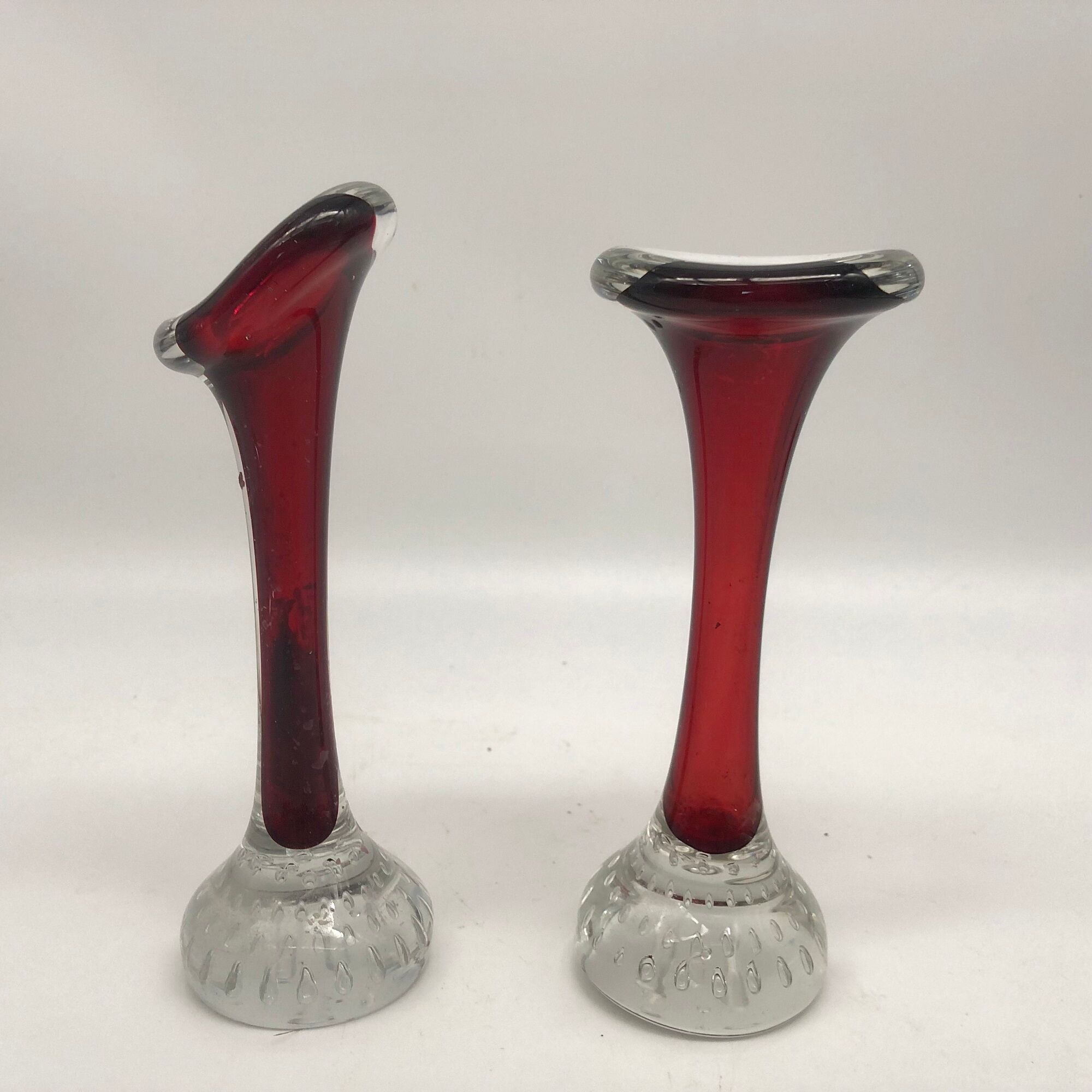 Duo of glass candle holders in the style of Murano