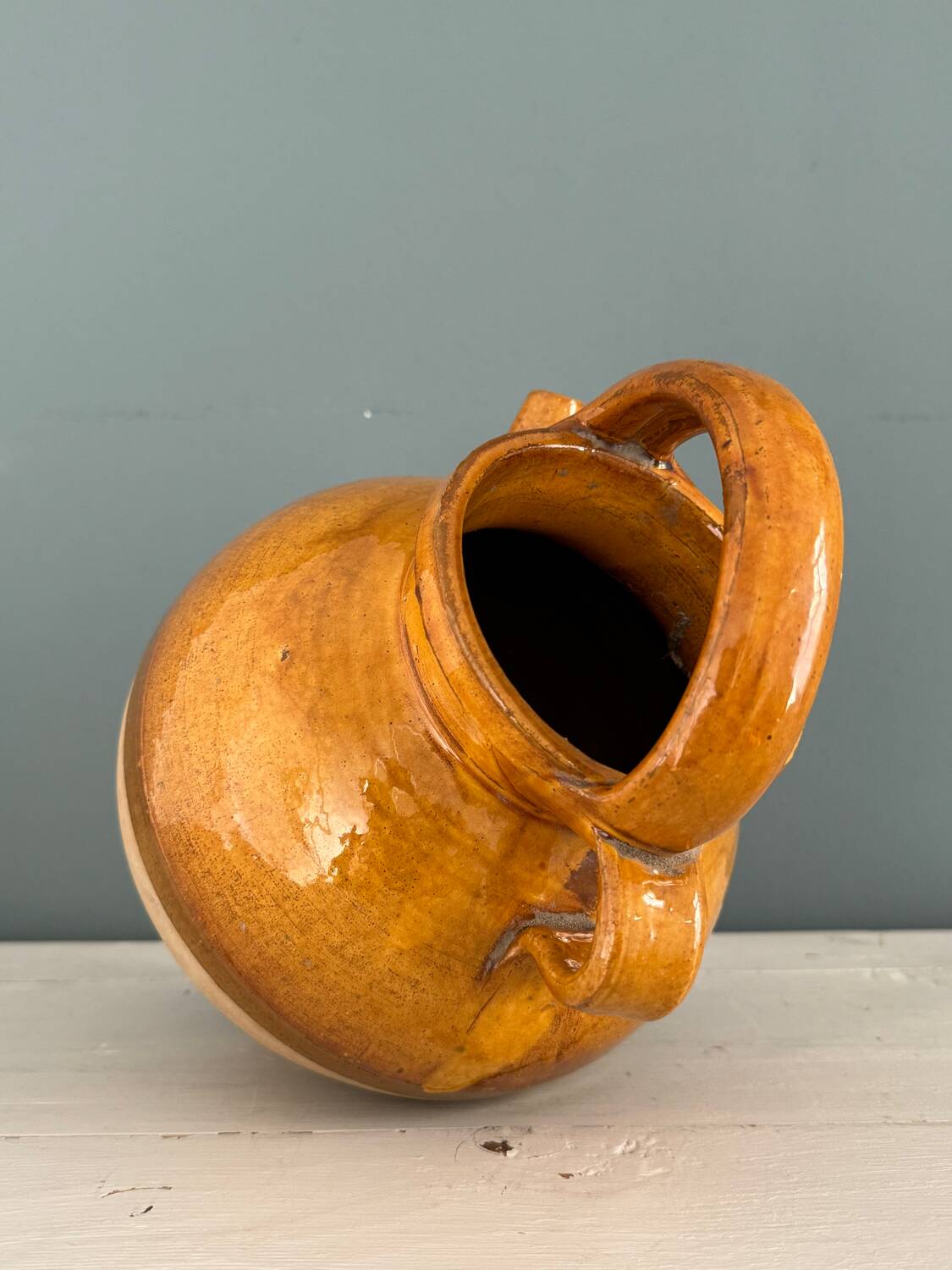 Old terracotta gargoulette jug