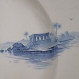 Flat in iron earth "views of the Orient" faience of Gien