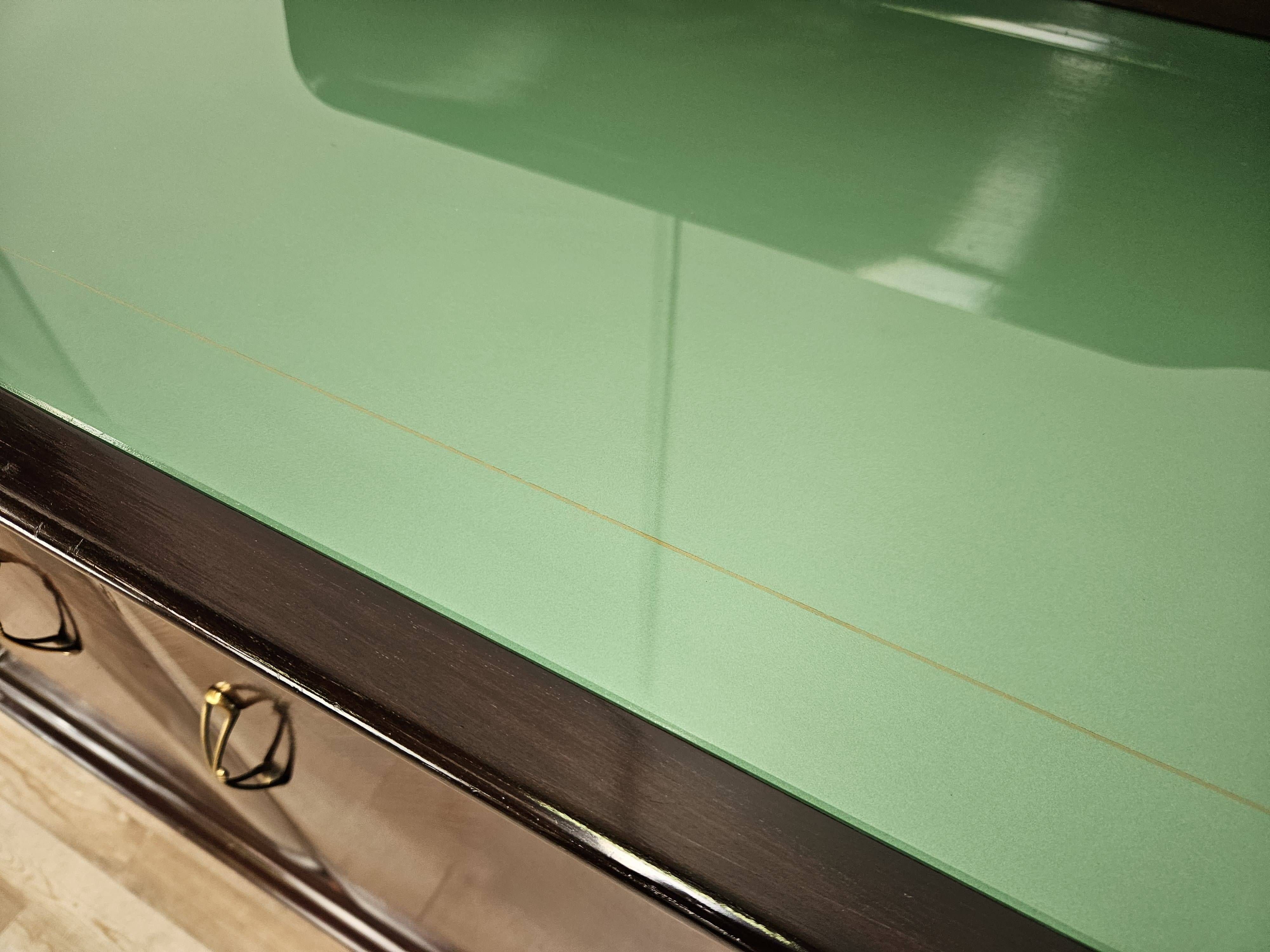 Mahogany sideboard with a glass top, 1960