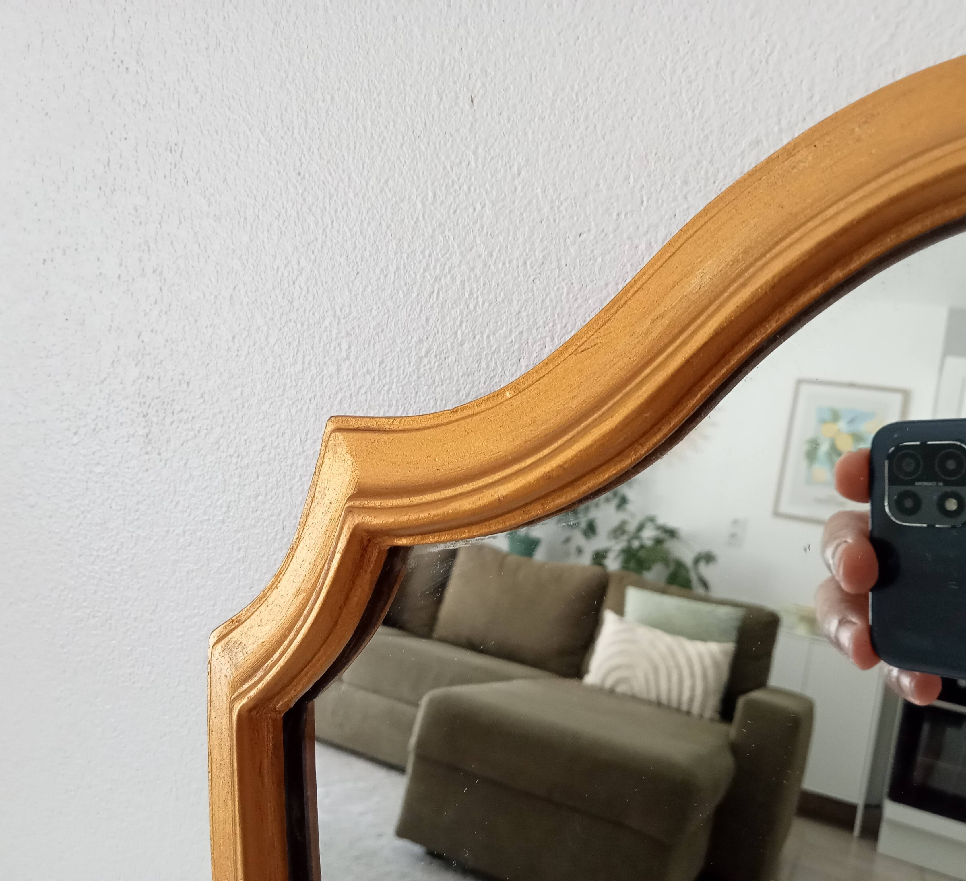 Vintage baroque mirror in gilded wood