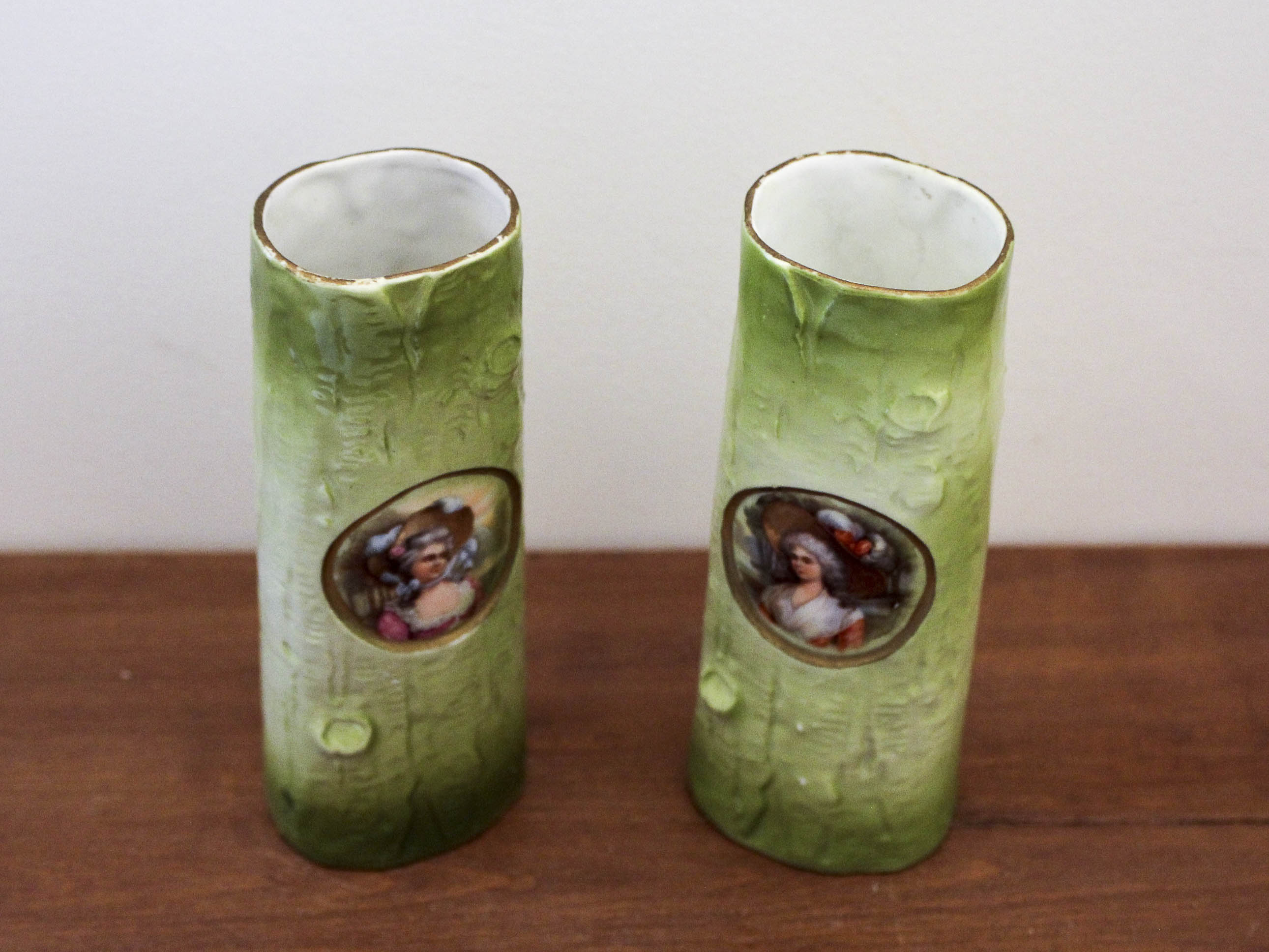 Pair of porcelain vases with portrait decoration of a woman