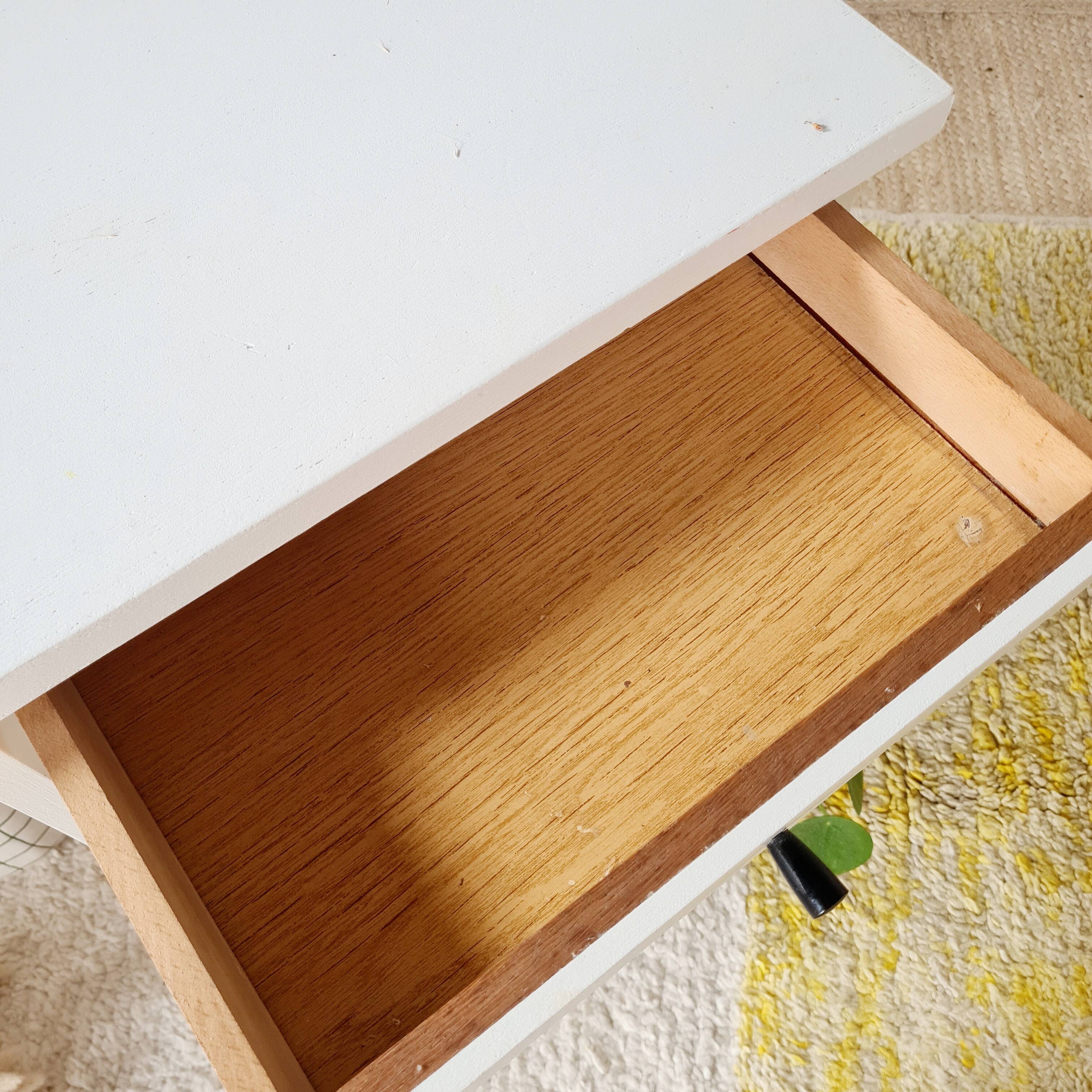 Vintage bedside table with tapered legs - white