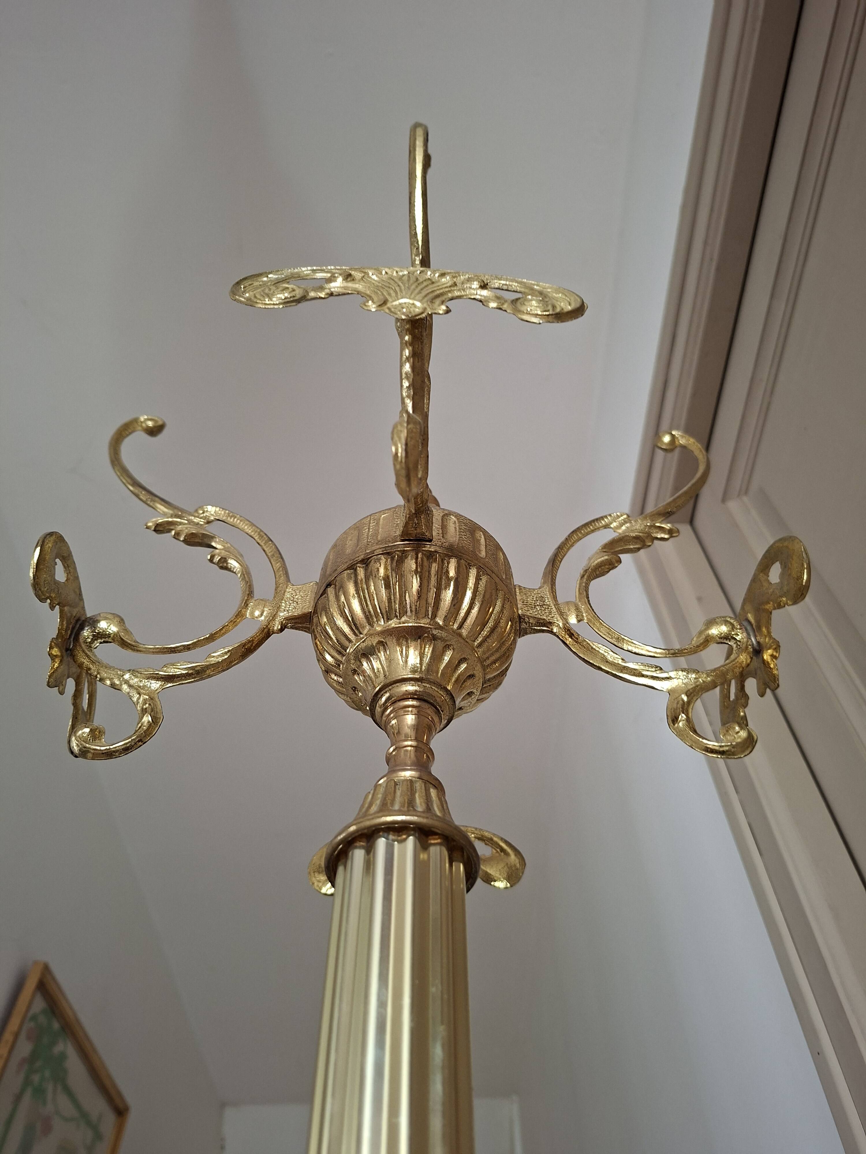 Golden parrot coat rack
