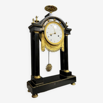 Empire period portico clock in black marble and gilded bronzes circa 1810-1815