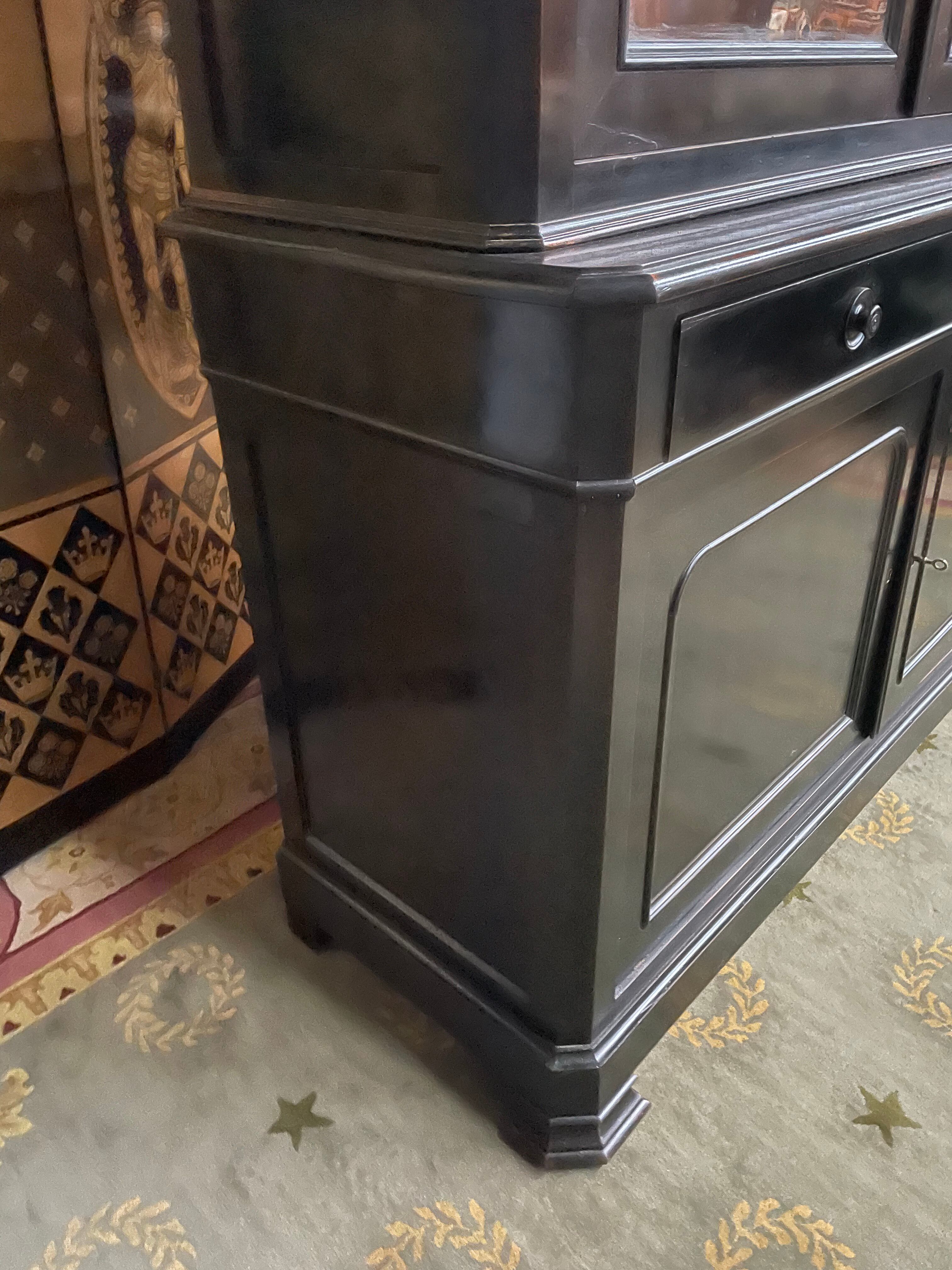 Louis Philippe two-body sideboard in blackened wood 19th