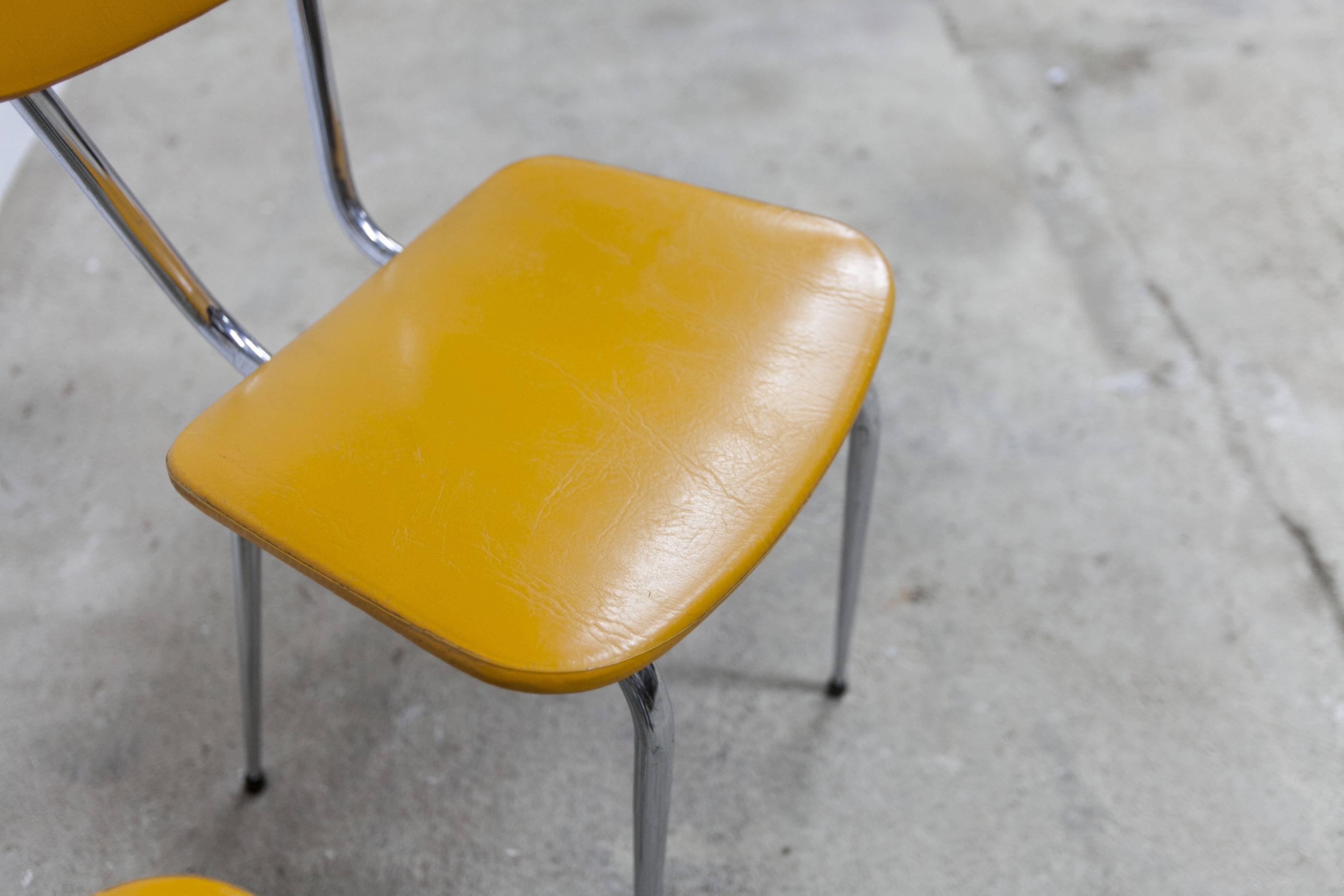 Pair of mustard-colored 70s welded Skai chairs