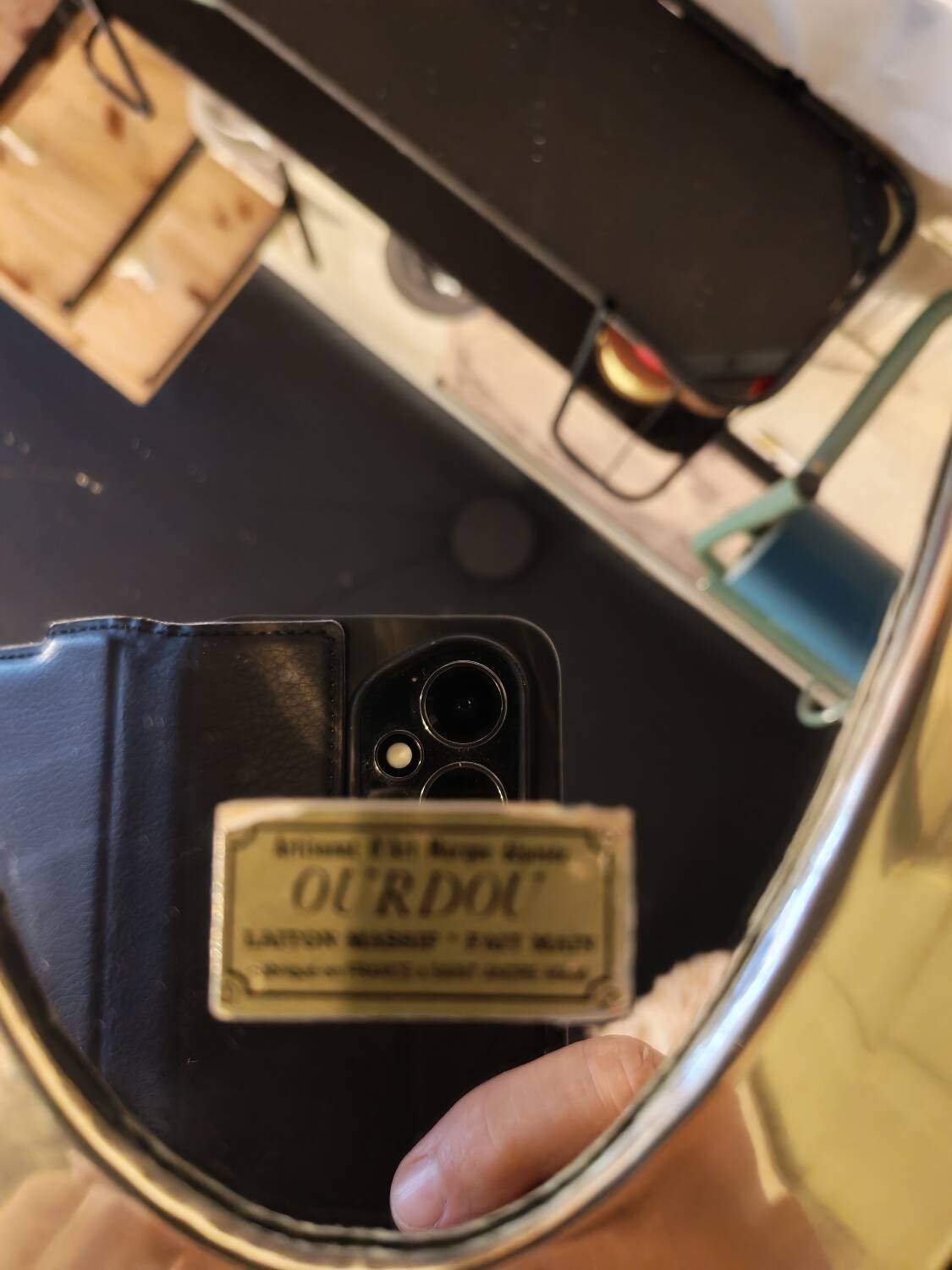 Vintage Urdu mirror in brass