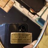 Vintage Urdu mirror in brass