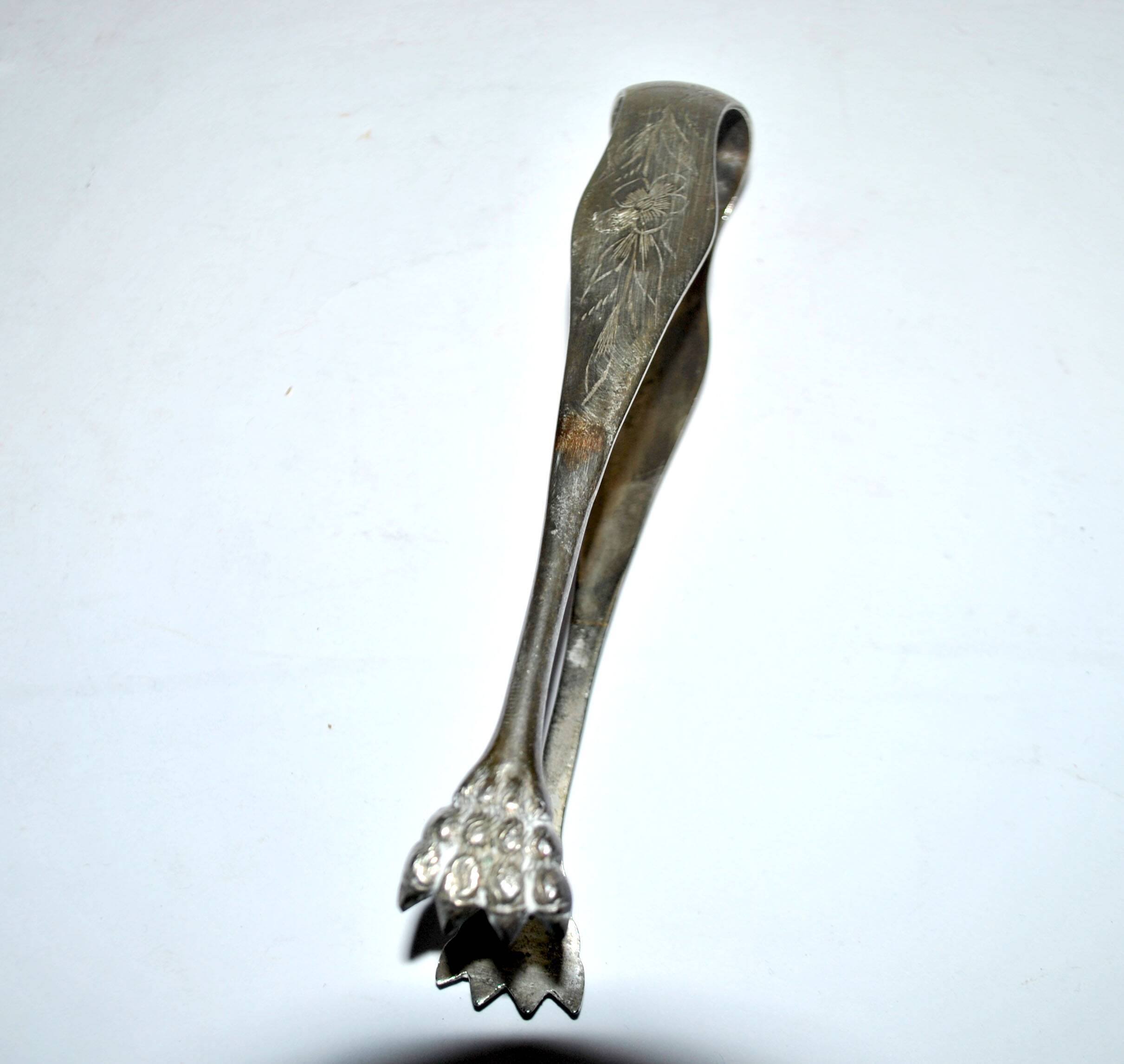 Vintage engraved silver metal lion claw sugar tongs