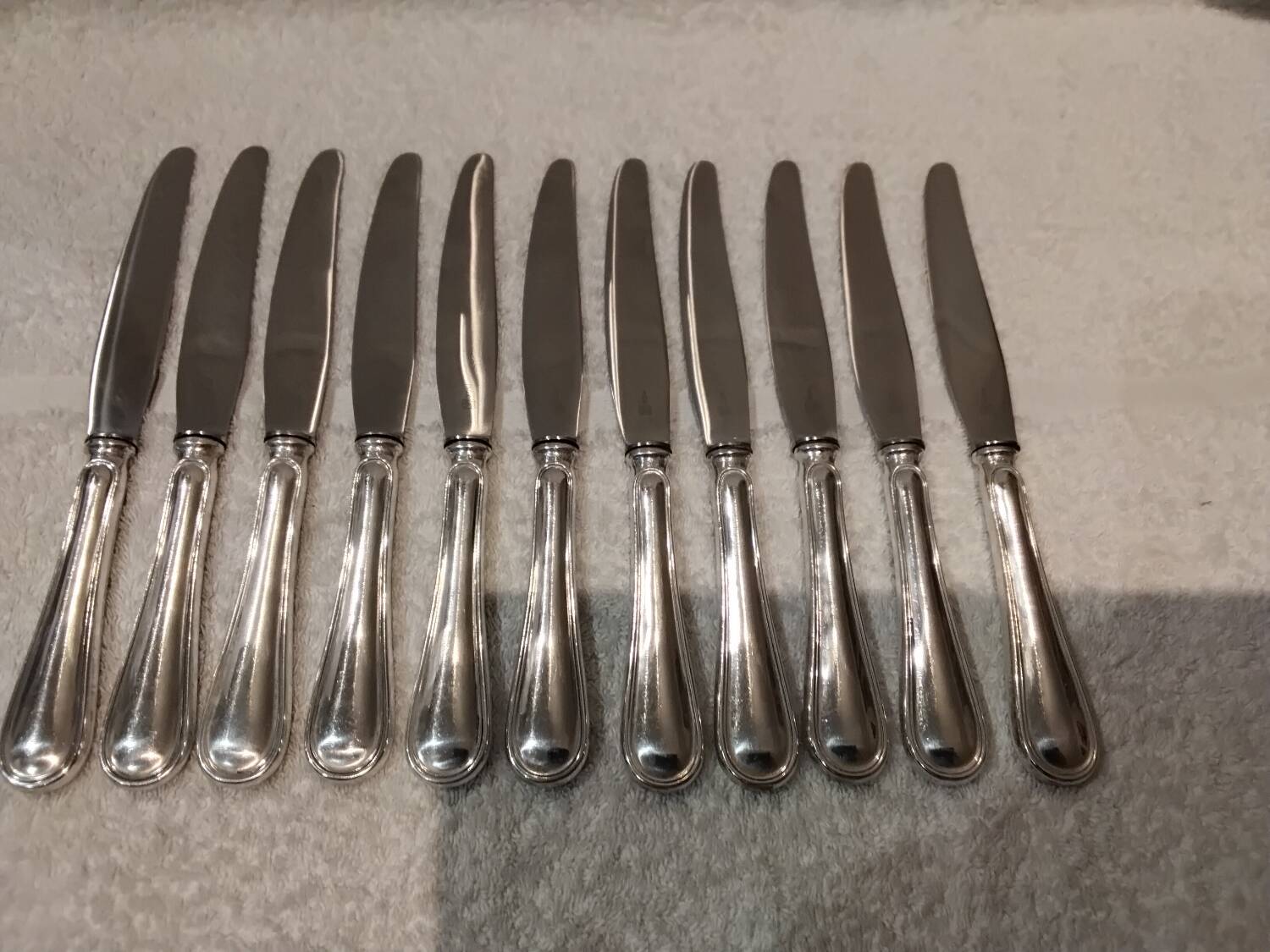 11 table knives with 800 silver handles, Swiss goldsmith Jezler filet