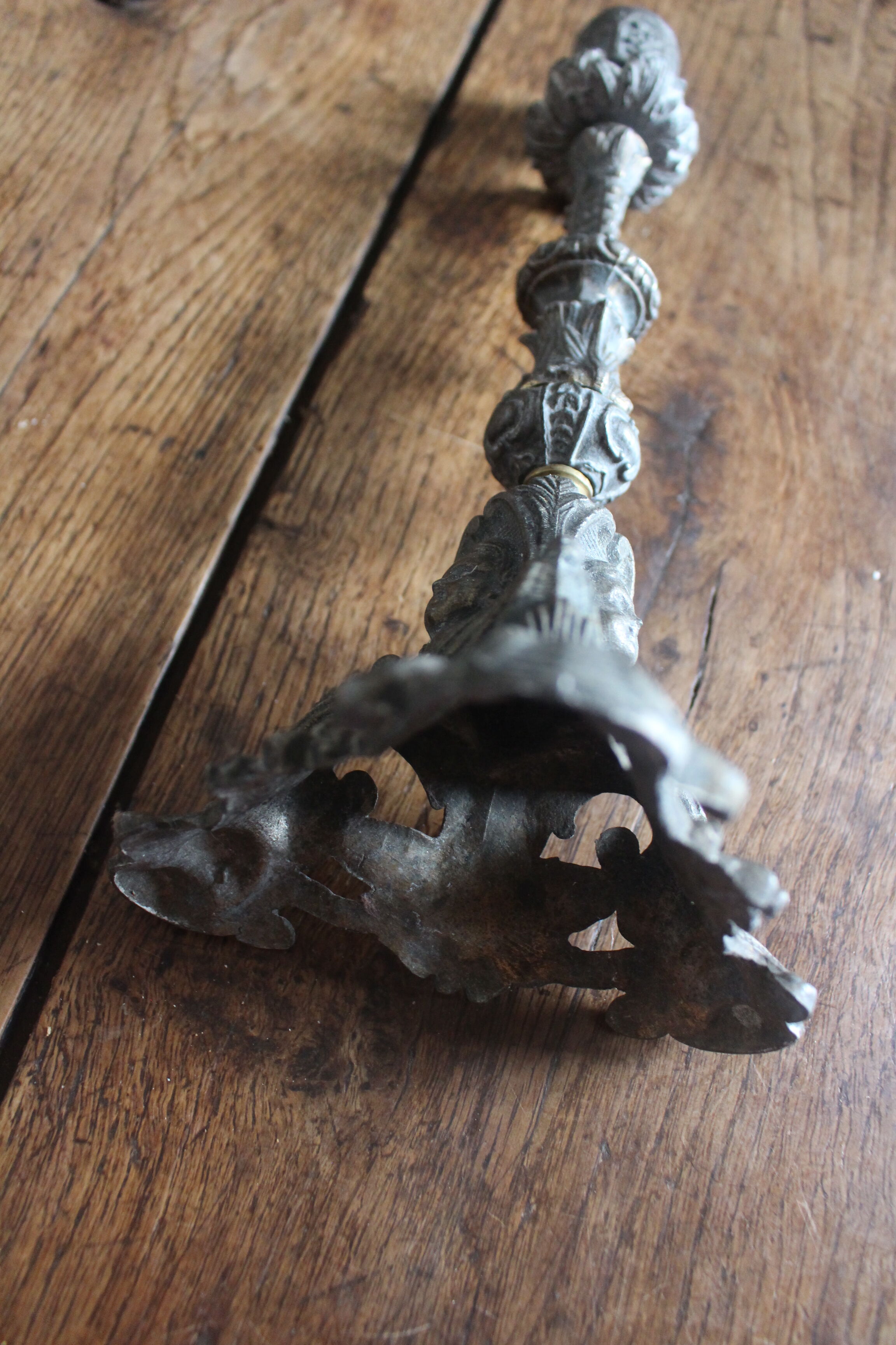 Grey cherub church torch candlestick