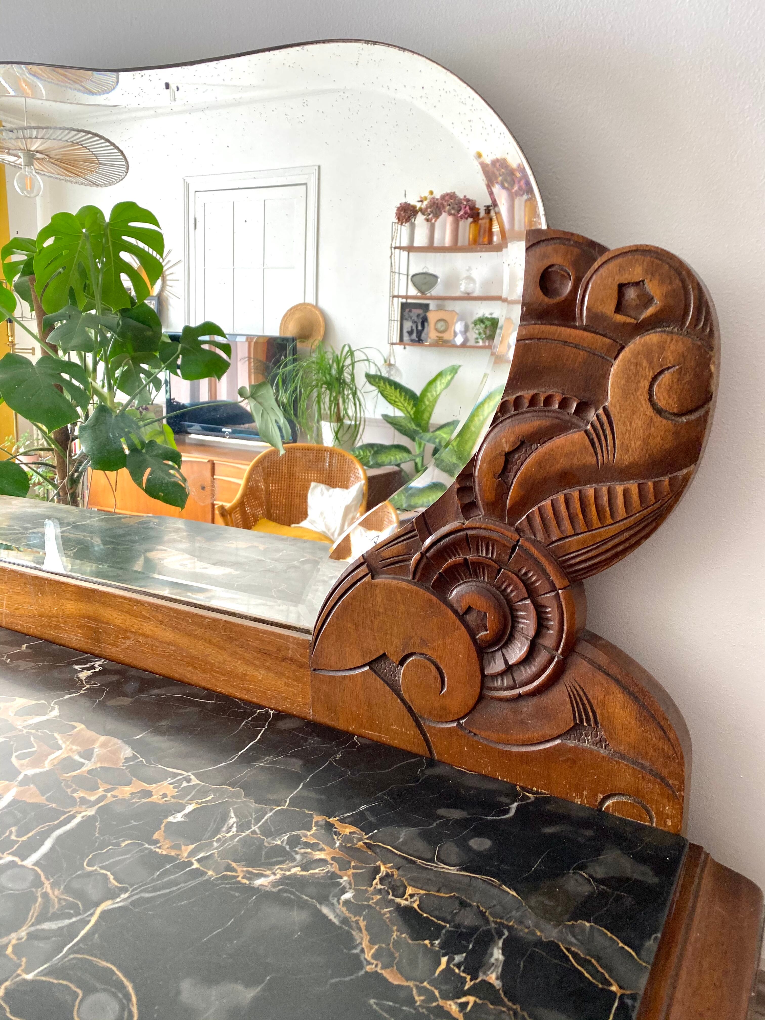 Art Deco black marble sideboard and vintage beveled mirror