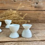 4 egg cups in white opaline glass