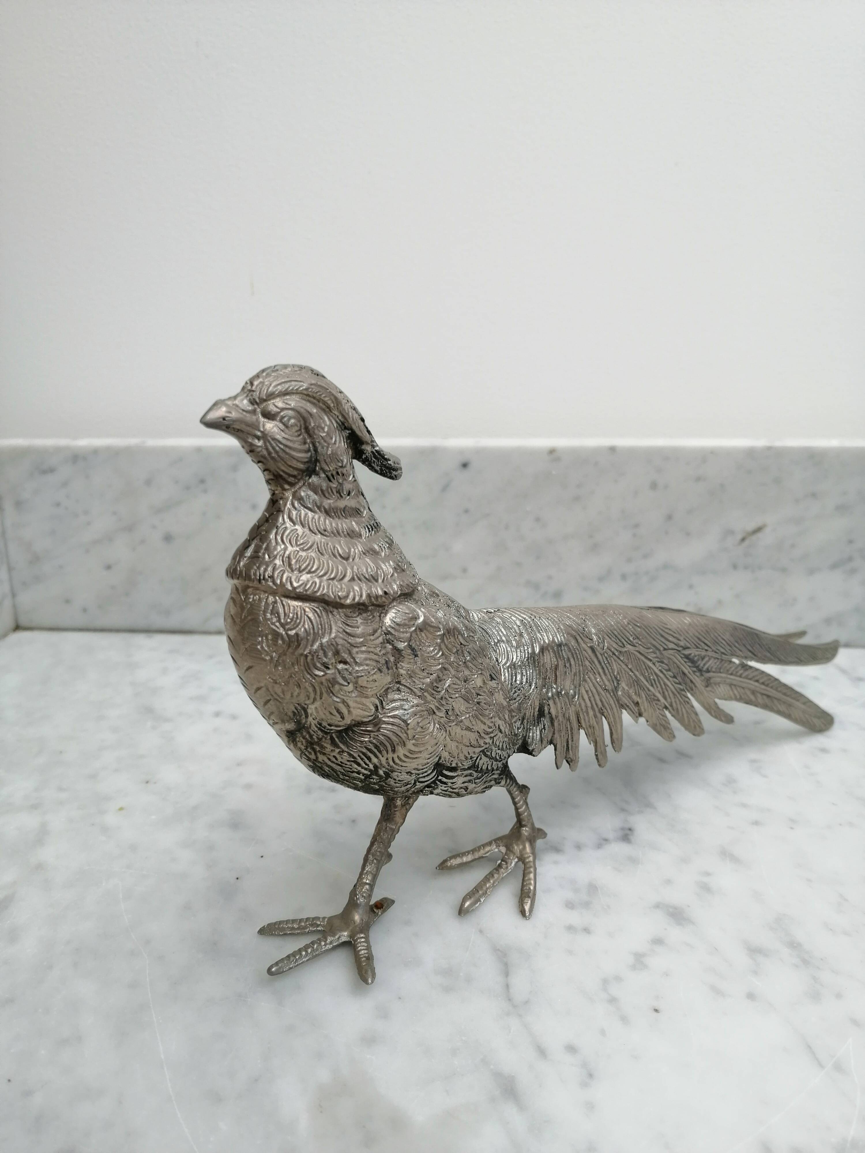 Couple of silver metal pheasants