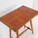 Vintage wooden side table with terracotta top