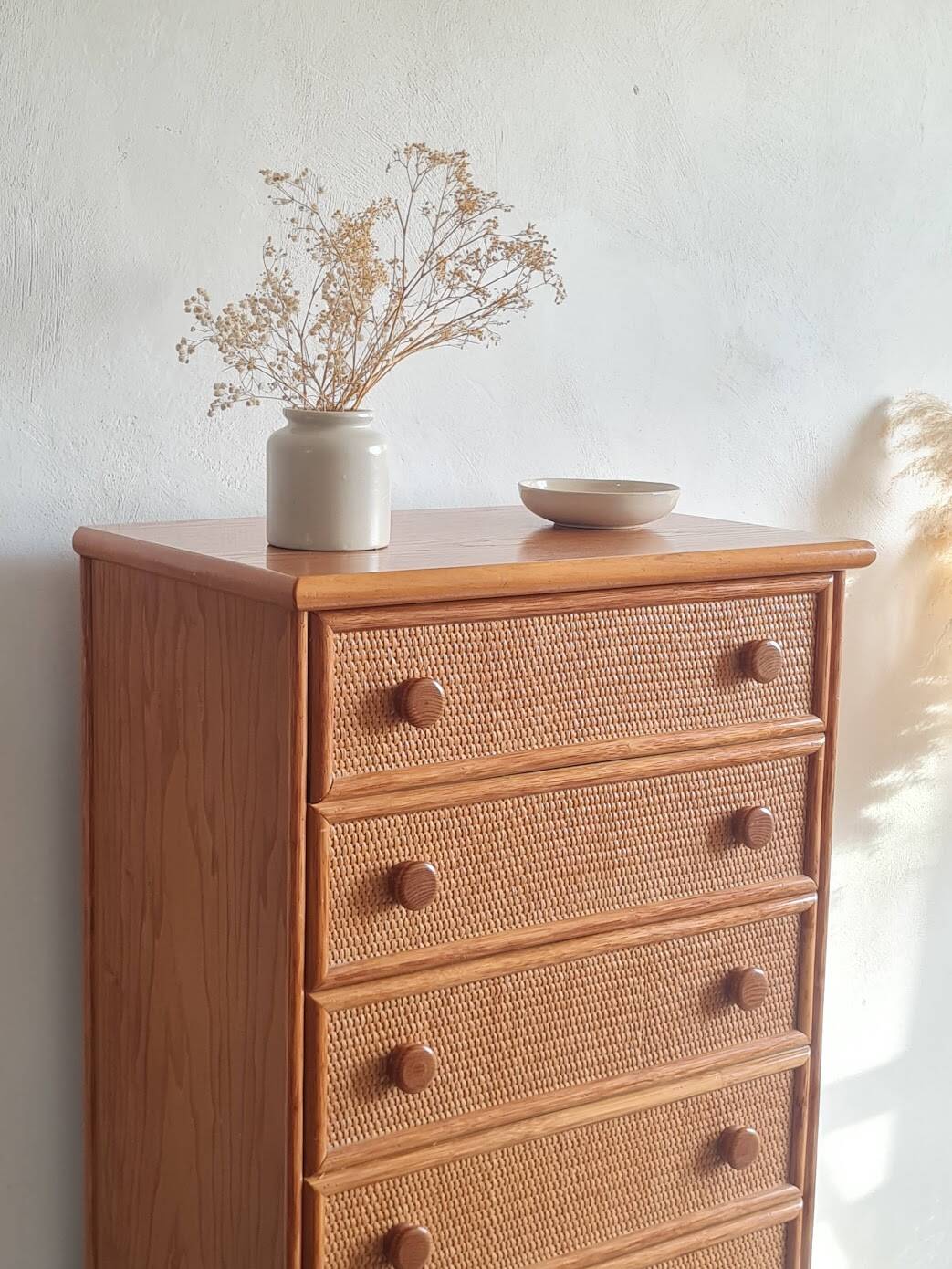Vintage wicker chest of drawers.