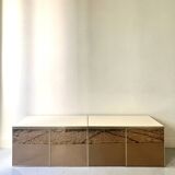 Low ivory lacquered enfilade, smoked mirror & brass JC Mahey, design 1970.