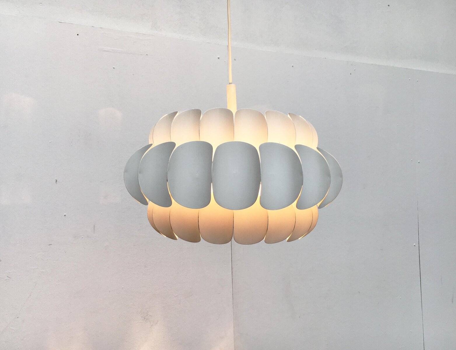 Mid-century white metal Swiss suspension by H. Zender for Temde.