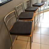 Set of 4 bar stools with metal structure and light wood seat