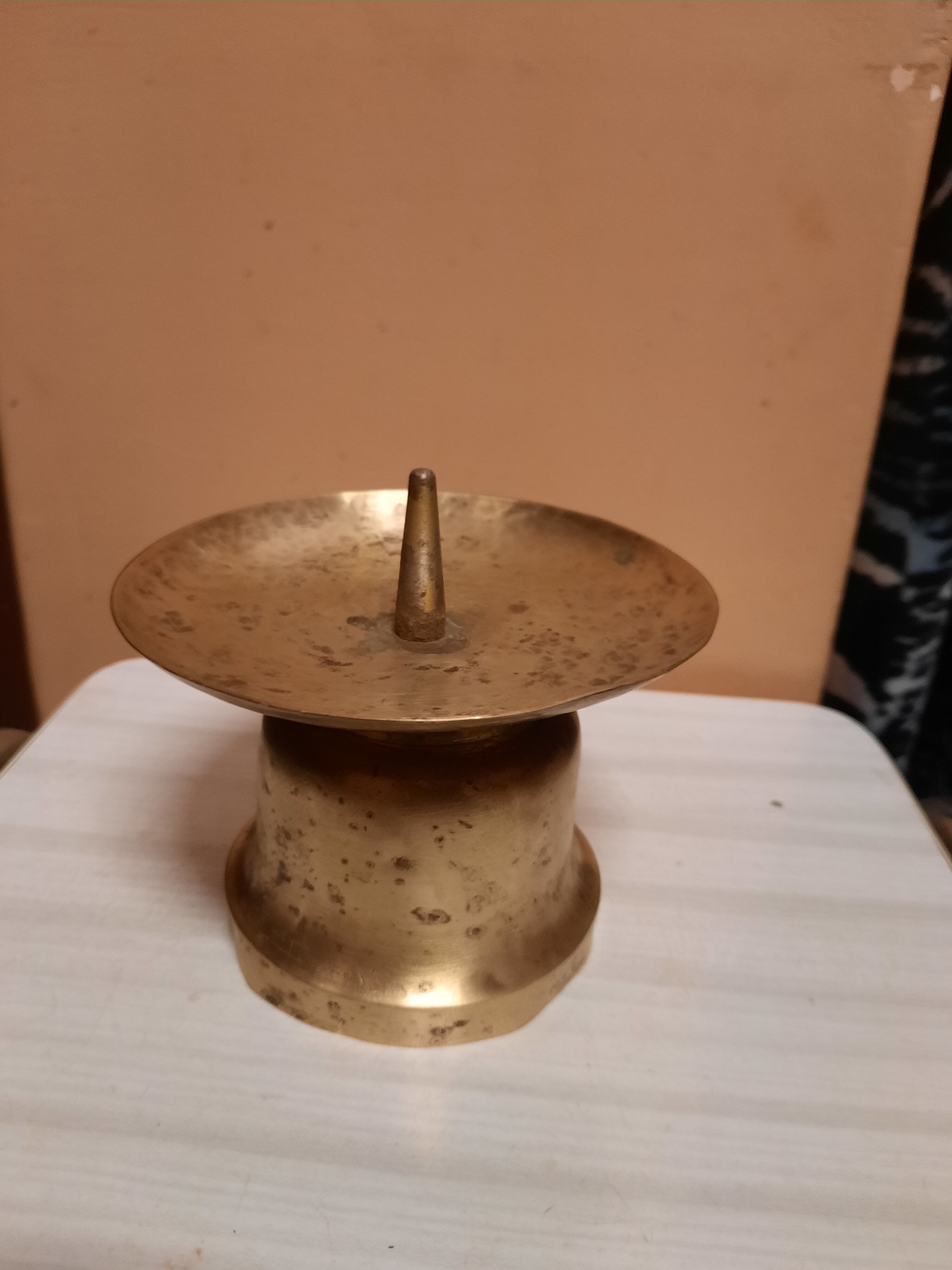 Brass candle pique