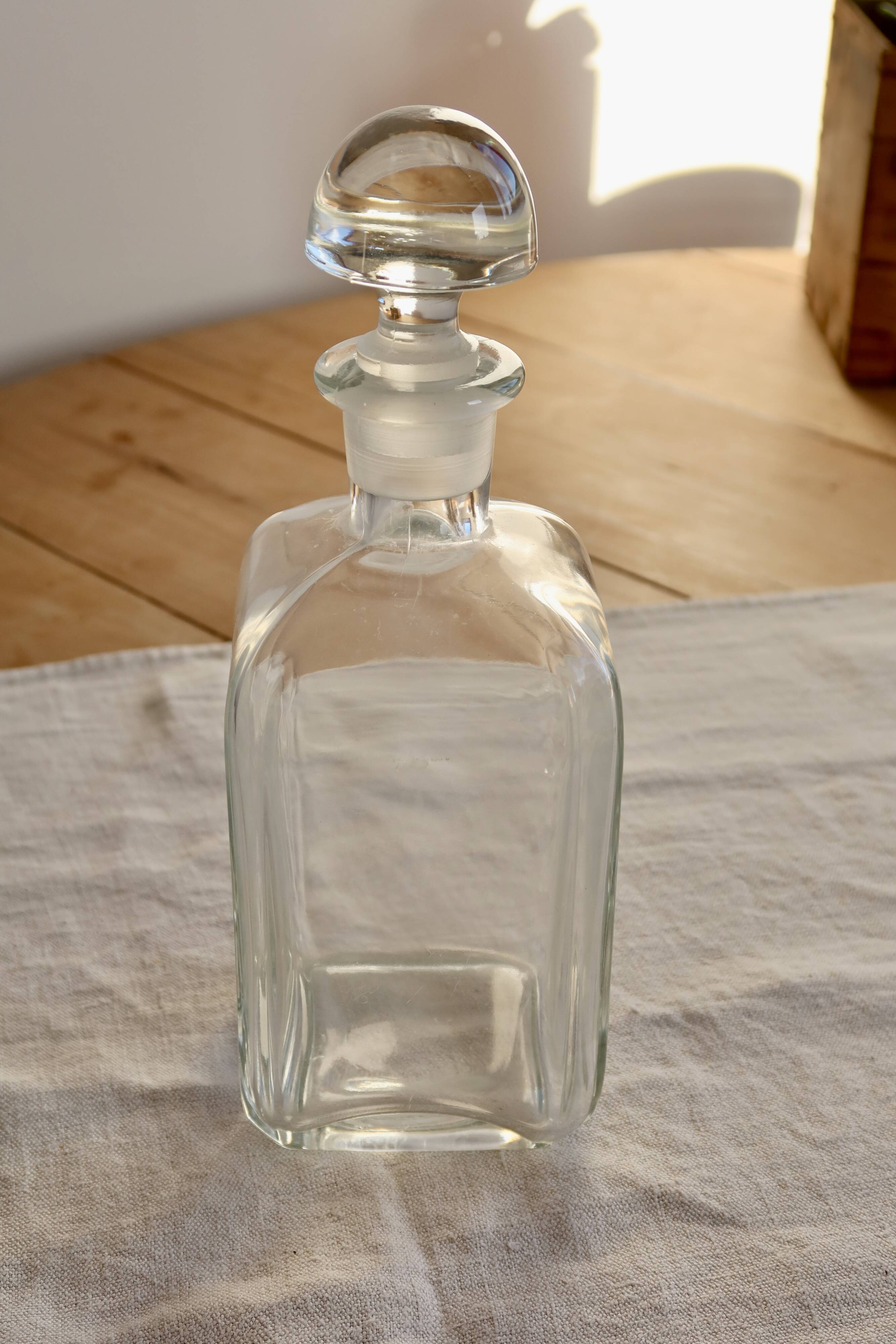 Antique glass carafe with stopper
