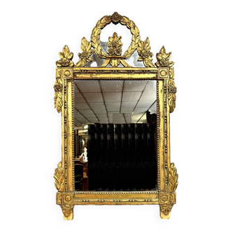 Miroir Louis XVI provençal en bois sculpté doré vers 1800