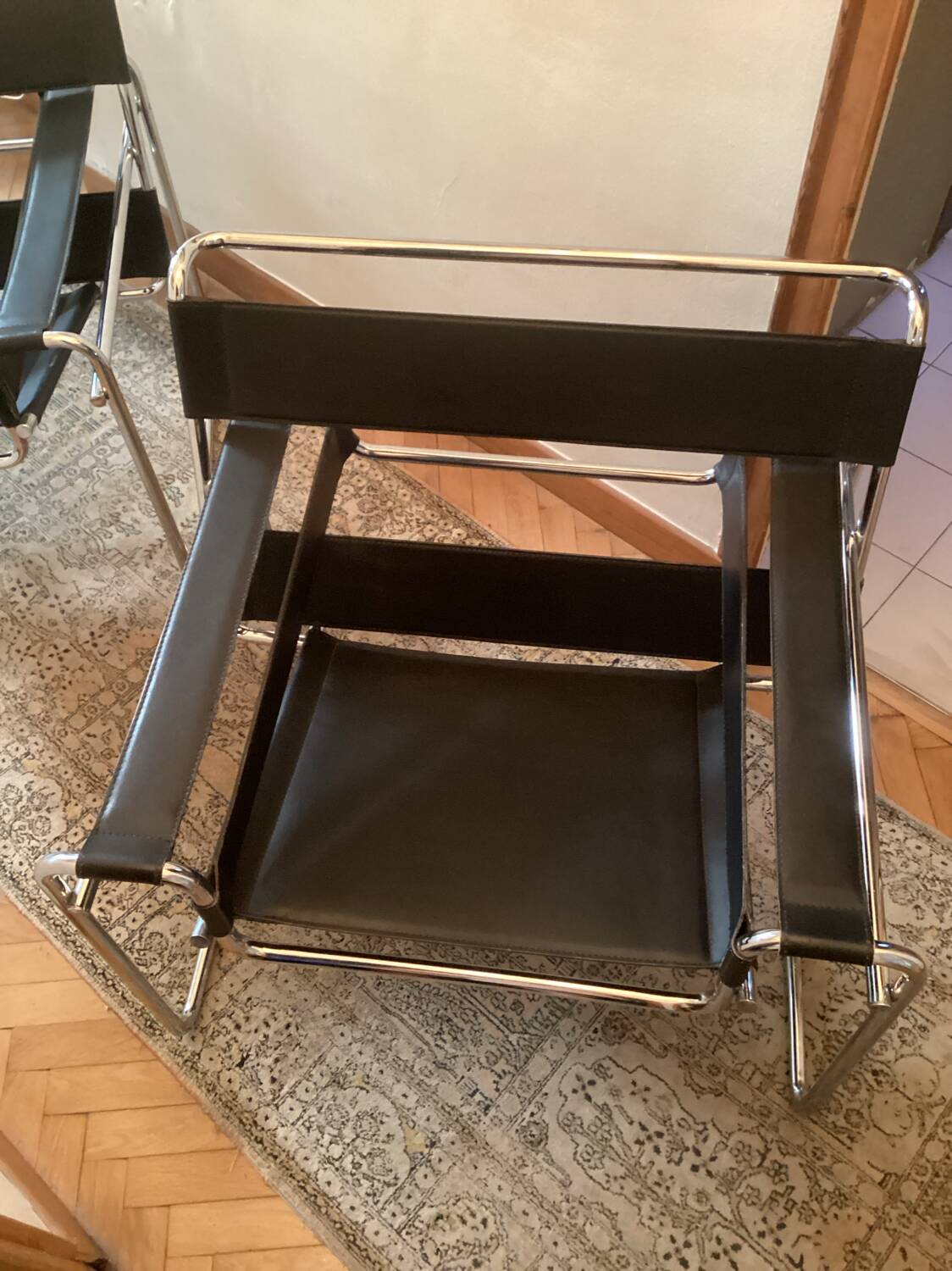 Pair of Wassily black leather armchairs