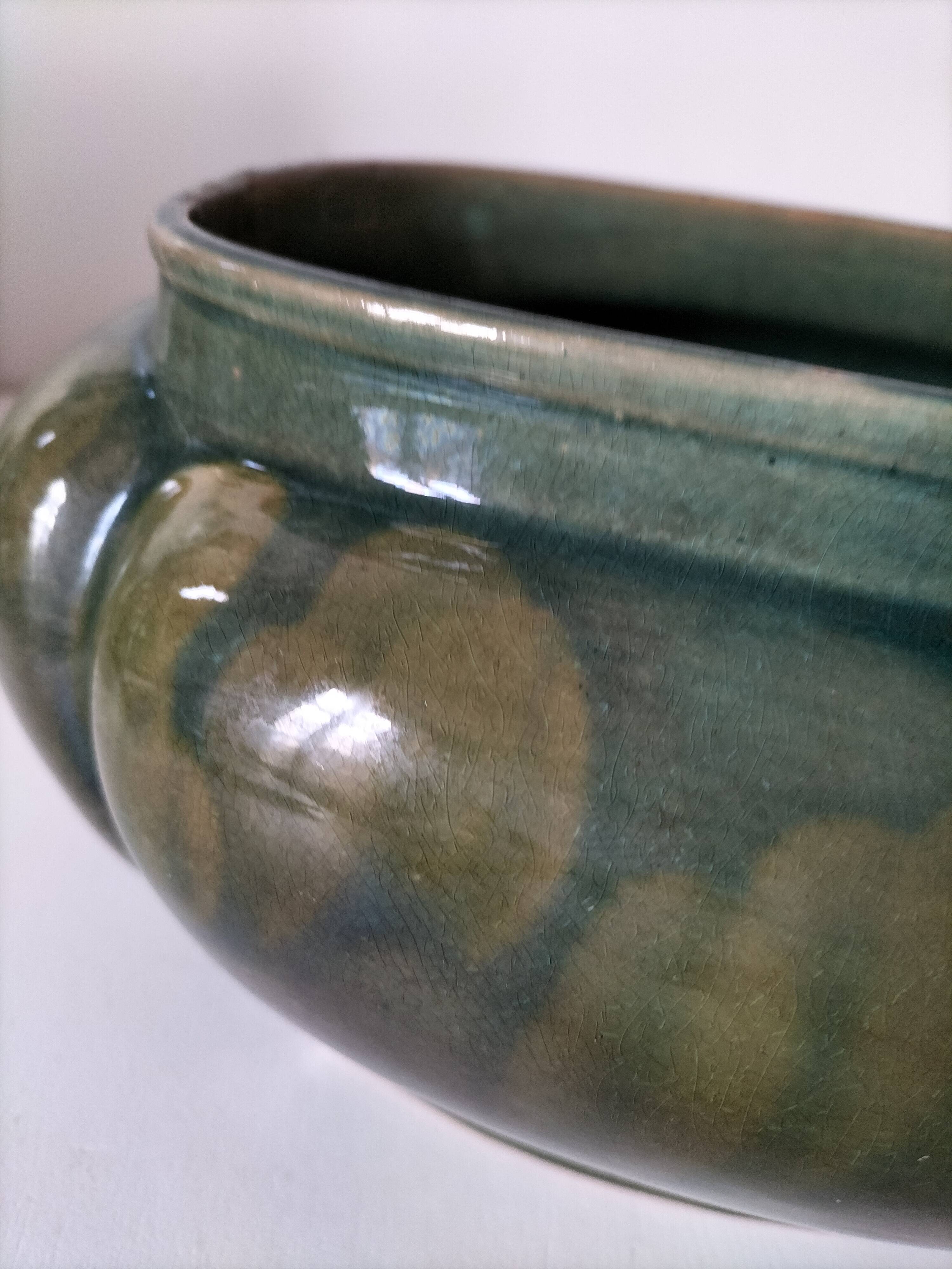 Art Deco flared cache-pot in turquoise glazed earthenware.