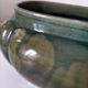 Art Deco flared cache-pot in turquoise glazed earthenware.