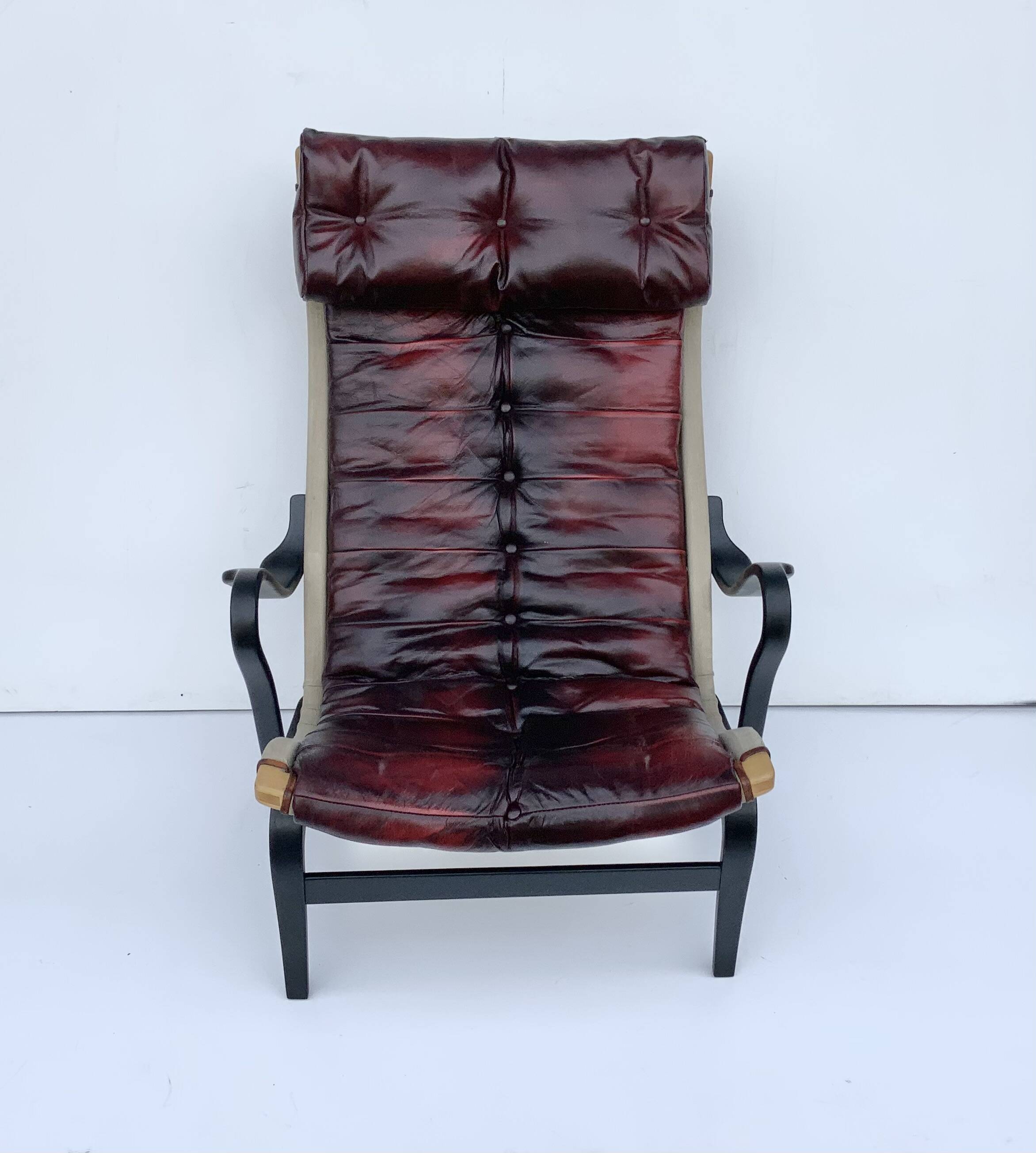 Vintage Pernilla 69 Armchair by Bruno Mathsson for Dux In Oxblood Leather