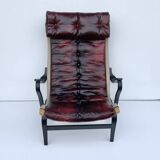 Fauteuil vintage Pernilla 69 de Bruno Mathsson pour Dux en cuir sang de bœuf