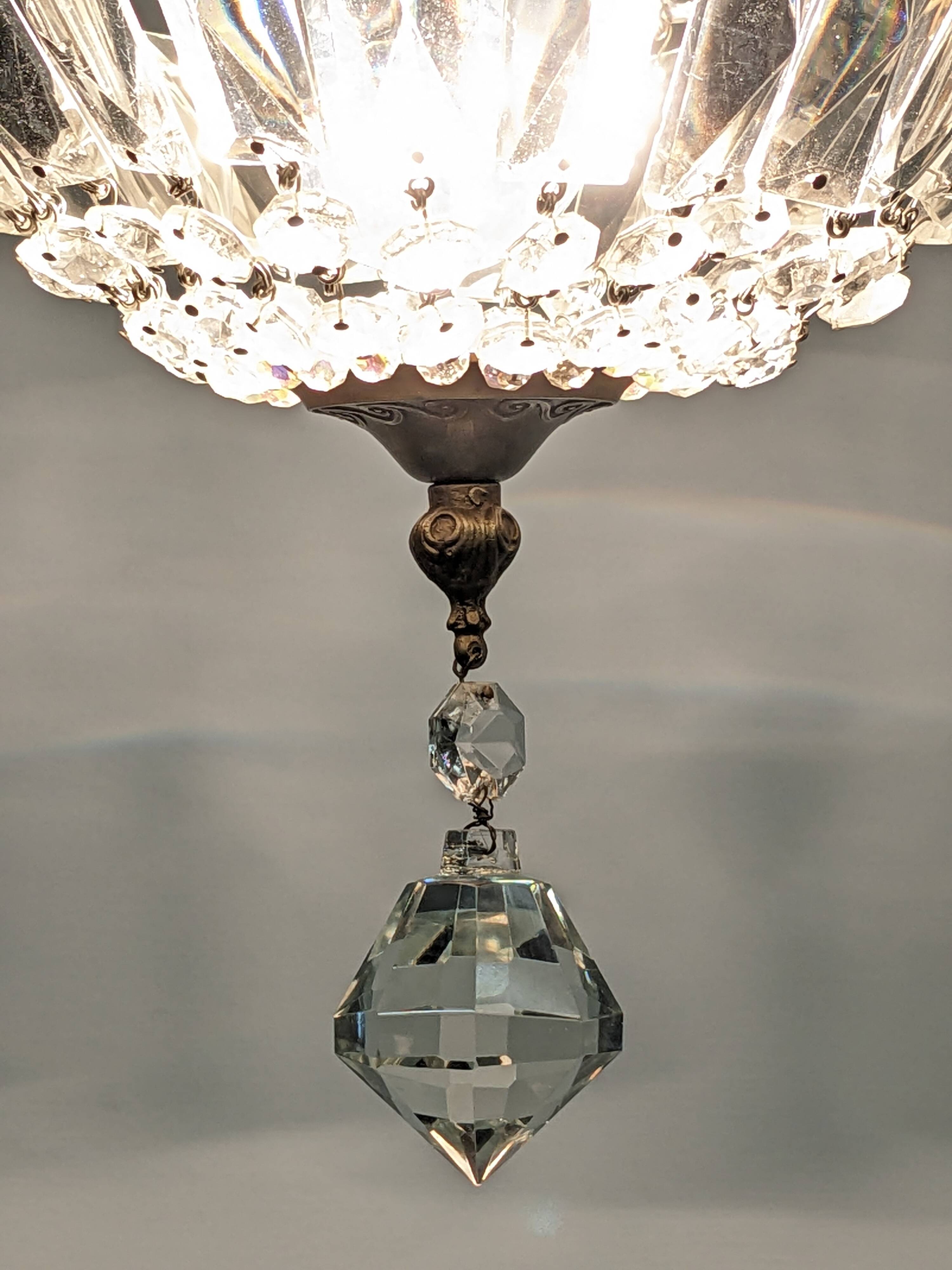 Louis XVI style bronze ceiling light and glass pendants