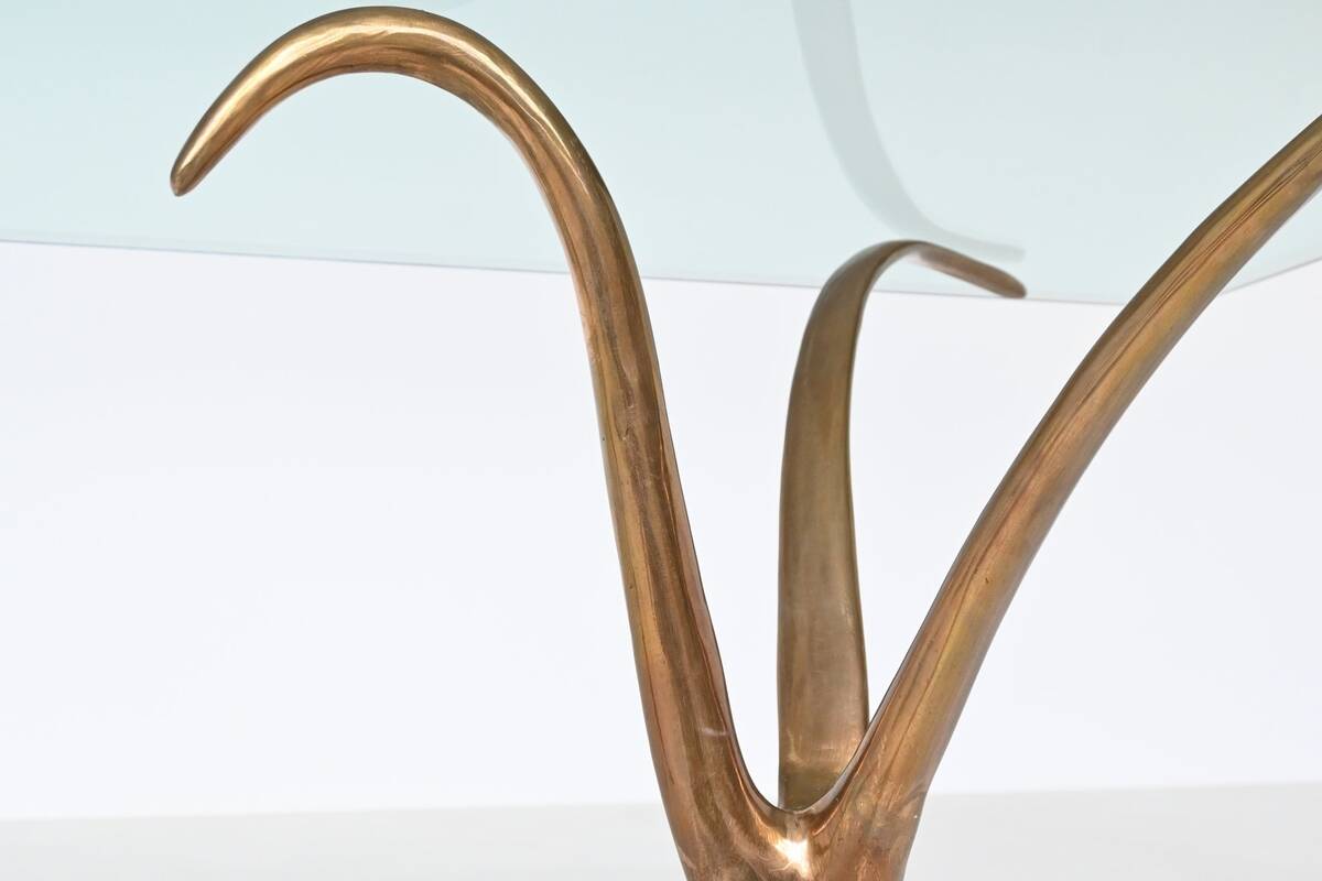 Unique sculptural dining table in bronze and glass, Belgium 1970.
