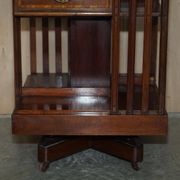 Restored Victorian walnut revolving library.