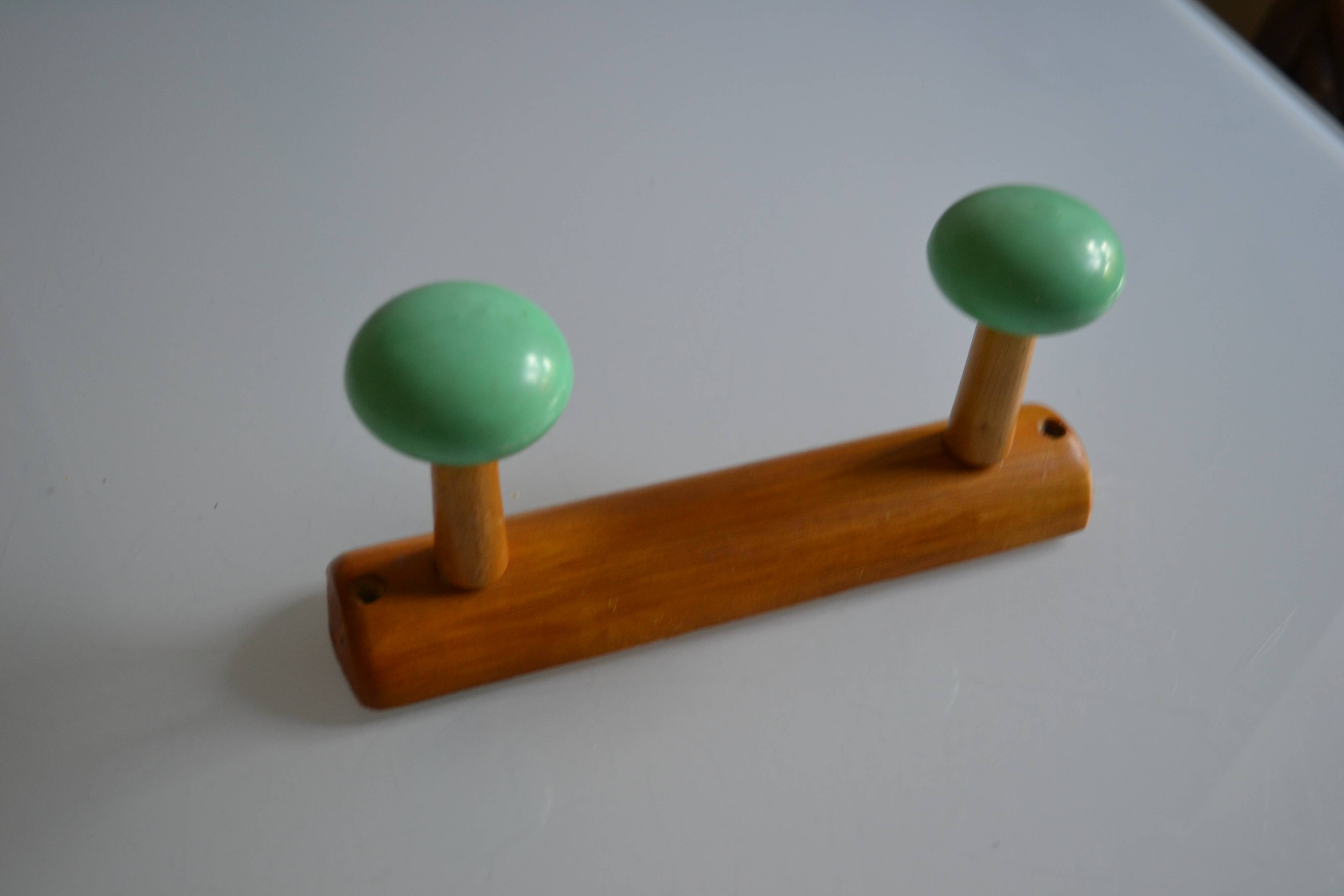 Wall coat rack with 2 hooks, wood and plastic, 60s style.