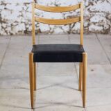 Pair of Scandinavian chairs in teak and faux leather, 1960.